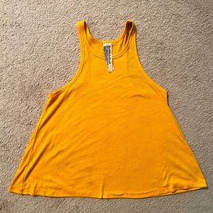 Beautiful bright yellow Free People soft tank.